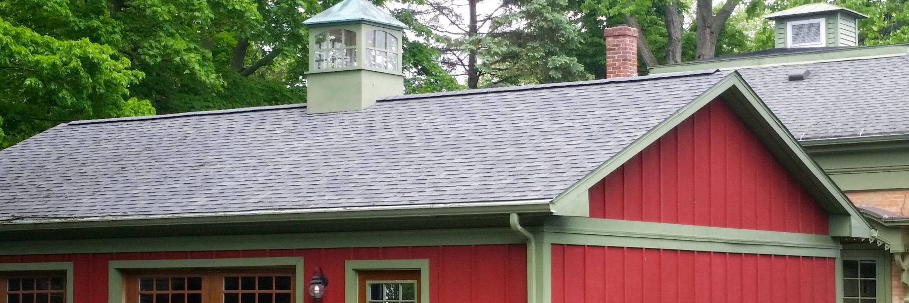 painted wooden cupola on two car garage